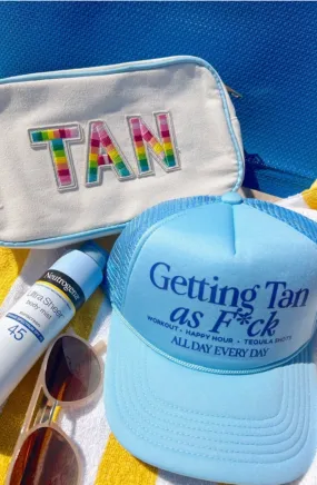 Getting Tan Blue Trucker Hat